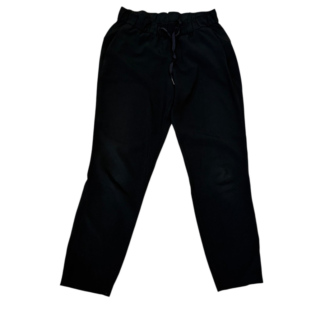 Lululemon Womens Size 6 On The Fly Mid-Rise Crop Black drawstring